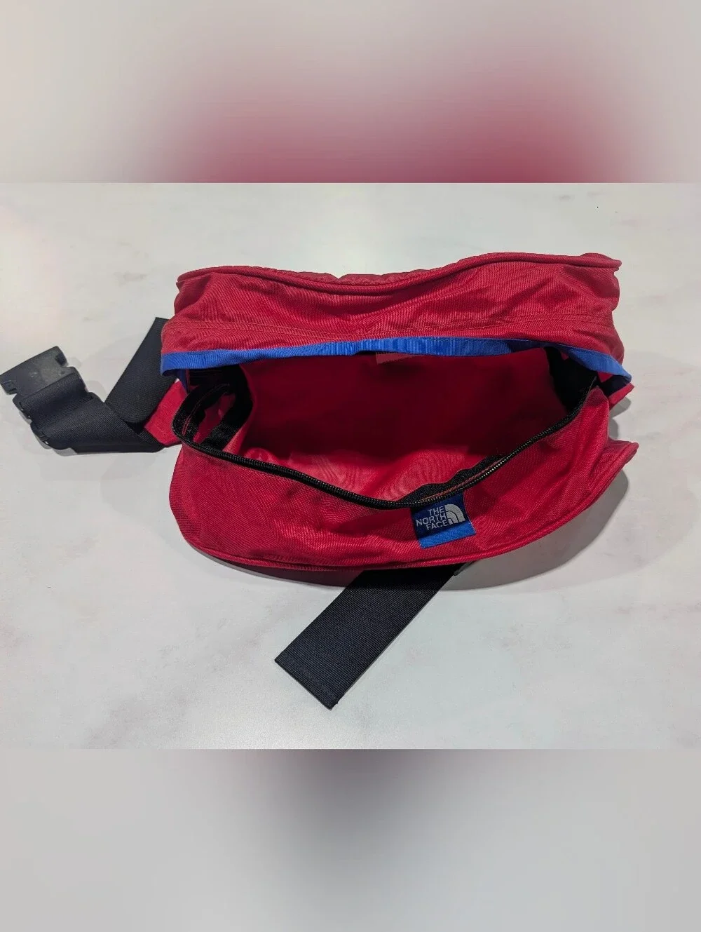 The North Face Red Lumbar Pack with Blue Trim
